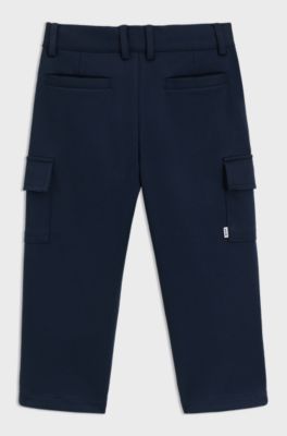 Pantaloni cargo con fit comodo per bambini realizzati in tessuto piqu&eacute; elasticizzato, Blu scuro