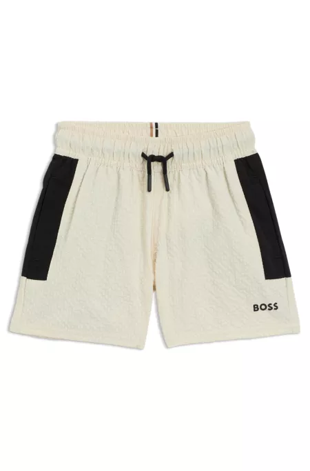 Short de bain en tissu seersucker à logo imprimé pour enfant
