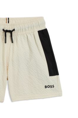 Boxer da mare per bambini in tessuto seersucker con logo stampato, Beige chiaro