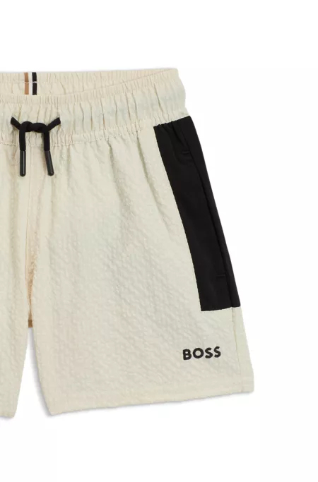 Short de bain en tissu seersucker à logo imprimé pour enfant