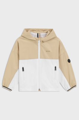 Kids-Windbreaker im Colour-Block-Design mit Kapuze und Logo-Details, Beige