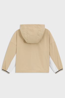 Kids-Windbreaker im Colour-Block-Design mit Kapuze und Logo-Details, Beige