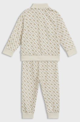 Tuta sportiva per bambini con motivo con monogramma all-over, Beige chiaro