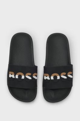 Kids' slides with signature-stripe logo, Black