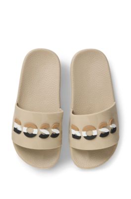 Sandali slider per bambini con logo con le righe tipiche del marchio, Beige
