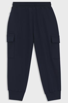 Kids' tracksuit bottoms with embroidered logo, Dark Blue