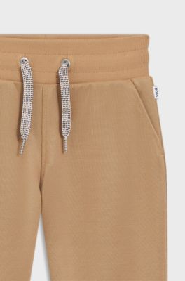 Tuta sportiva per bambini in misto cotone con logo, Marrone