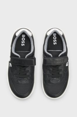 Kindersneakers met logo&rsquo;s van leer en canvas, Zwart