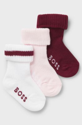 Three-pack of baby socks with logos, White