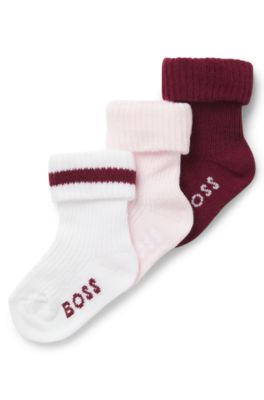 Three-pack of baby socks with logos, White