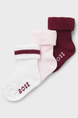 Three-pack of baby socks with logos, White
