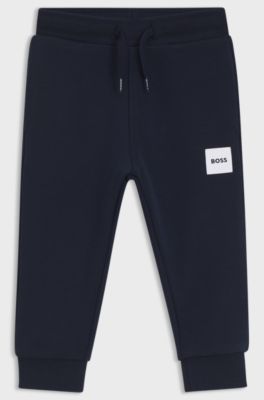 Pantaloni della tuta in pile per bambini con etichetta con logo, Blu scuro