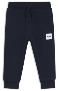 Kids' fleece tracksuit bottoms with logo label, Dark Blue