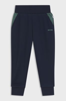 Jogginghose f&uuml;r Kinder mit Eins&auml;tzen im Monogramm-Muster, Dunkelblau