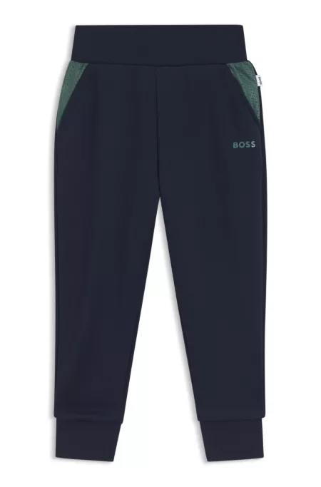 Jogginghose für Kinder mit Einsätzen im Monogramm-Muster