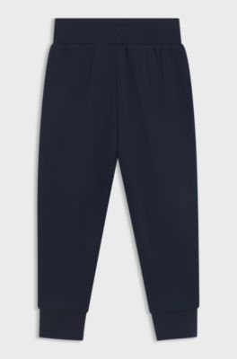 Jogginghose f&uuml;r Kinder mit Eins&auml;tzen im Monogramm-Muster, Dunkelblau