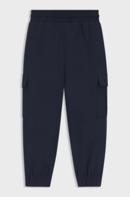 Kids' tracksuit bottoms with cargo pockets, Dark Blue