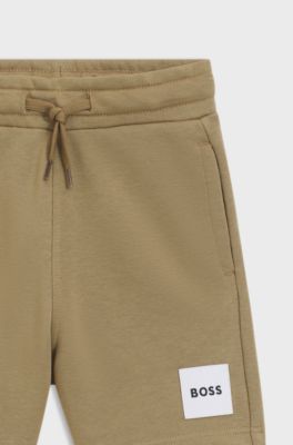 Kids' fleece shorts with logo label, Brown