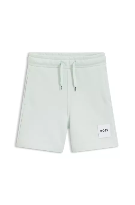 Shorts para niños de forro polar con etiqueta con logo