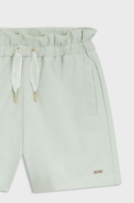 Kids' shorts in crinkle fabric with paperbag waistband, Light Green