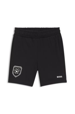 Kids' shorts with football artwork, Black
