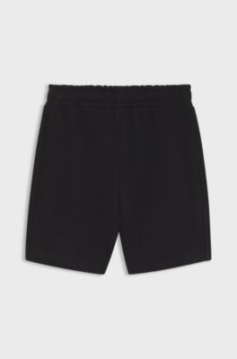 Kids' shorts with football artwork, Black