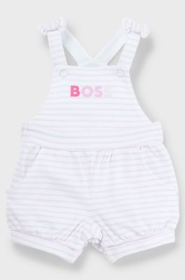 Baby dungarees in striped cotton with printed logo, White