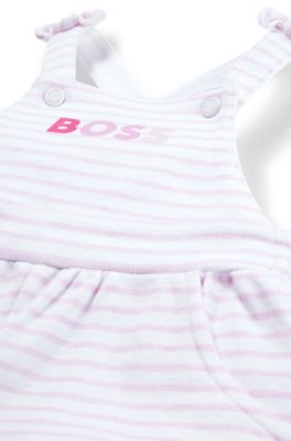 Baby dungarees in striped cotton with printed logo, White