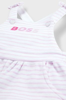 Baby dungarees in striped cotton with printed logo, White