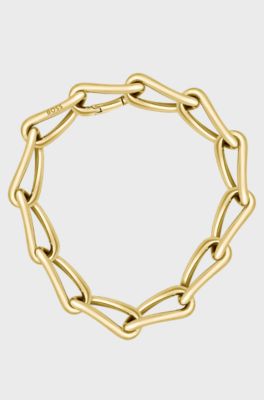 Gold-tone necklace with twisted tubular links, Gold tone
