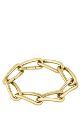 Bracelet doré à maillons tubulaires torsadés
