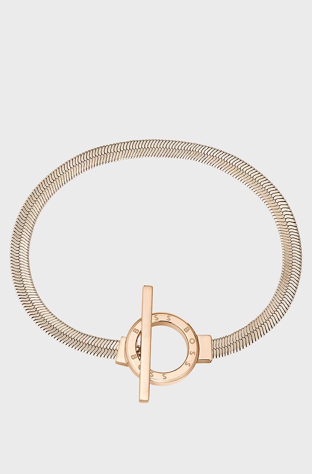 Gold-tone herringbone-chain bracelet with toggle closure, Gold