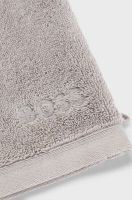 Zilverkleurig washandje van Ege&iuml;sche katoen met ton-sur-ton logo, Zilver