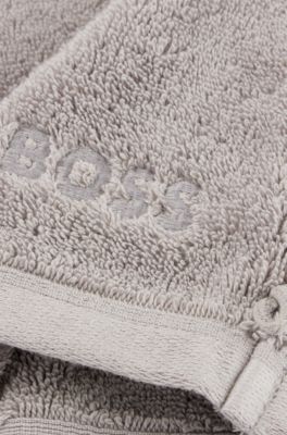 Zilverkleurig washandje van Ege&iuml;sche katoen met ton-sur-ton logo, Zilver