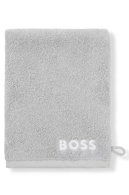 Gant de toilette en coton avec logo brodé en contraste