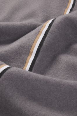 Fleece throw with signature-stripe ribbon, Grey