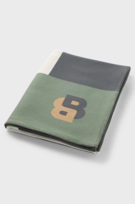 Jacquard throw with whipstitching, Patterned