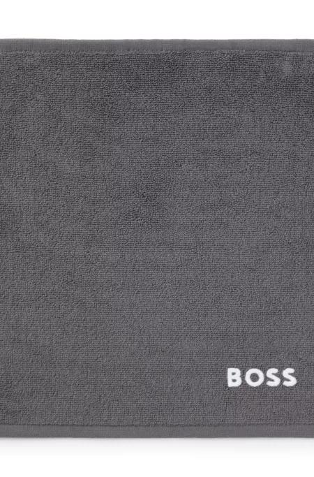 Cotton face cloth with contrast embroidered logo