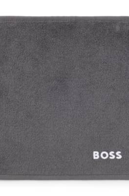 Cotton face cloth with contrast embroidered logo 1