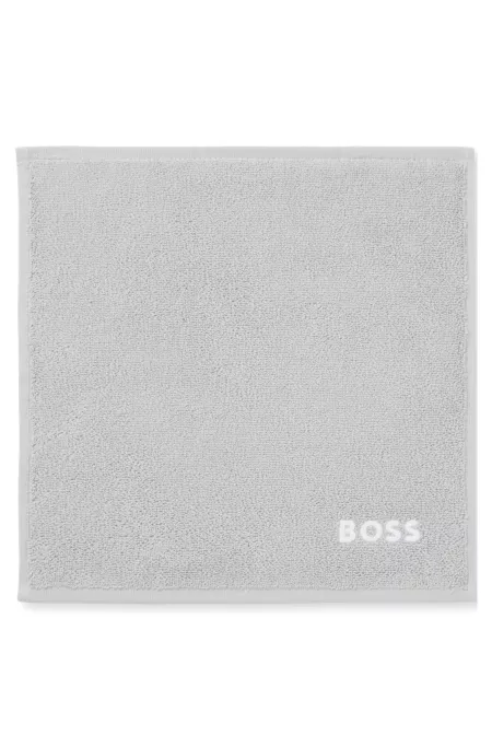 Cotton face cloth with contrast embroidered logo