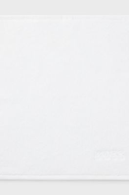 Cotton face cloth with contrast embroidered logo, White