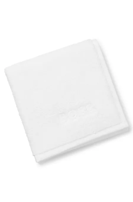 Cotton face cloth with contrast embroidered logo