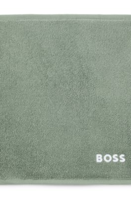 Cotton face cloth with contrast embroidered logo, Green
