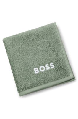 Cotton face cloth with contrast embroidered logo, Green