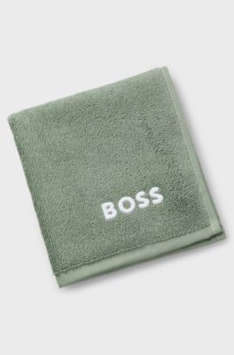 Cotton face cloth with contrast embroidered logo, Green