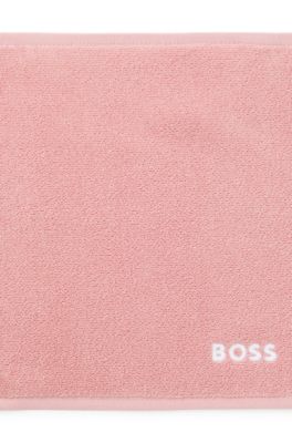 Cotton face cloth with contrast embroidered logo, light pink
