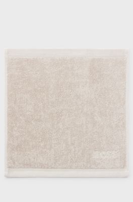 Aegean-cotton face cloth with tonal logo, Beige