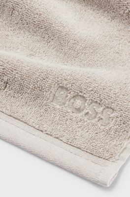 Aegean-cotton face cloth with tonal logo, Beige
