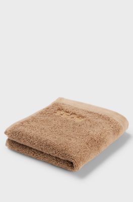 Aegean-cotton face cloth with tonal logo, Brown