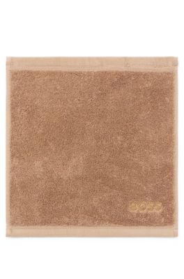Aegean-cotton face cloth with tonal logo, Brown
